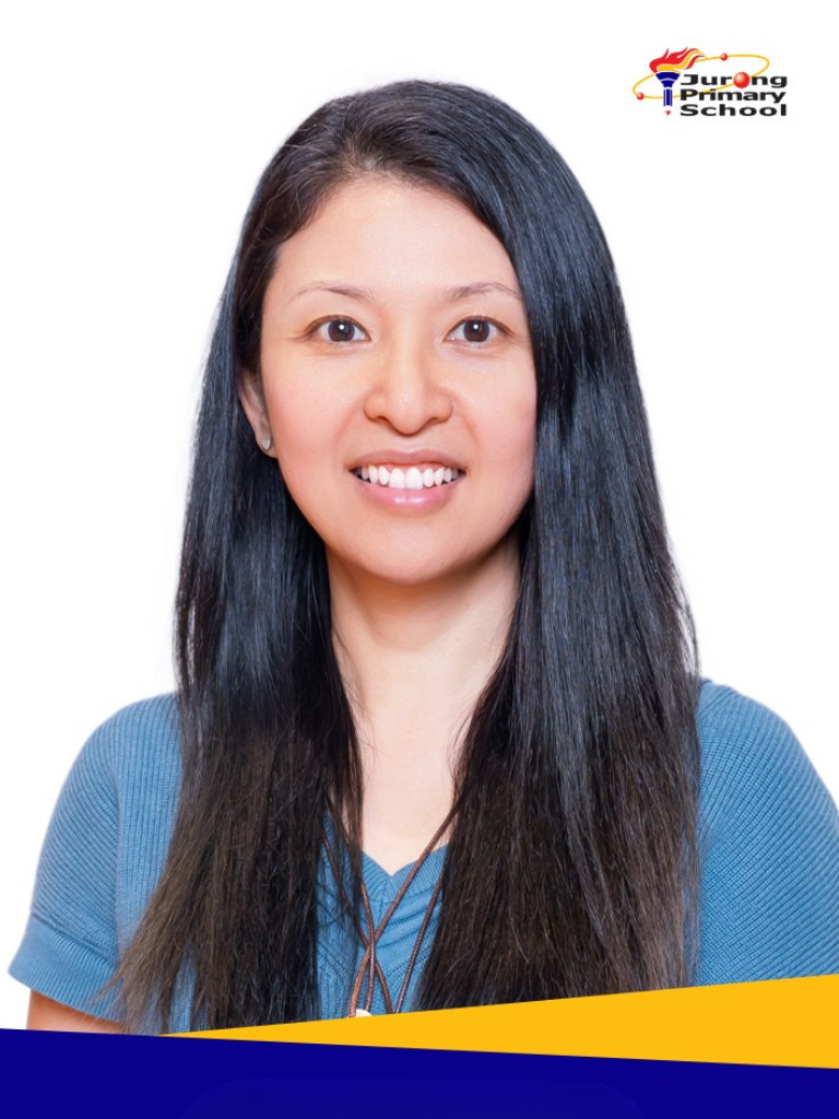 Smiling woman in blue top, long straight black hair, necklace.